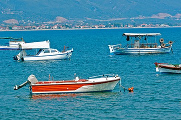 Image showing Fishing boats with deep blue sea