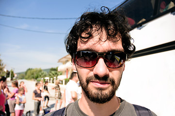 Image showing Young tourist in his sunglasses traveling