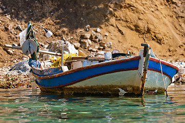 Image showing Small fishing boat on the shore