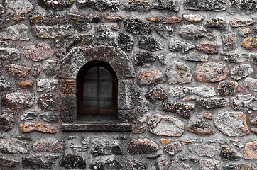 Image showing Old windows on brick wall