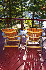 Image showing Forest cottage deck and chairs