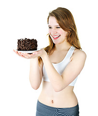 Image showing Young girl holding chocolate cake