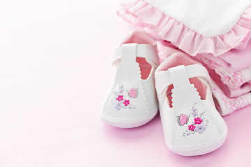 Image showing Pink baby clothes for infant girl