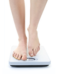 Image showing Feet on bathroom scale