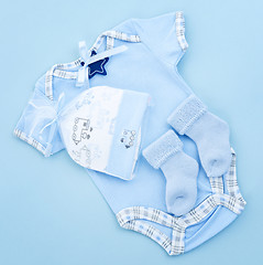 Image showing Blue baby clothes for infant boy