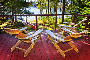 Image showing Forest cottage deck and chairs