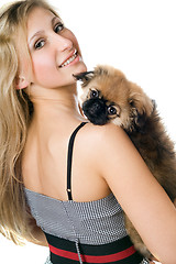 Image showing Portrait of woman and puppy