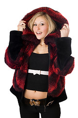 Image showing Cheerful blond woman in fur jacket