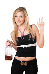 Image showing Young woman posing with a bottle