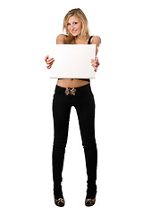 Image showing Playful blonde holding white billboard