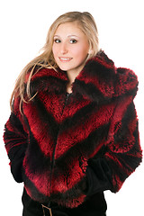 Image showing Portrait of joyful blond woman in fur jacket