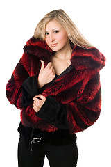 Image showing Sexy blond woman in a fur jacket