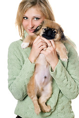 Image showing Young woman with a pekinese