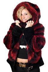Image showing Joyful blond woman in fur jacket