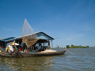 Image showing Fishing boat at floating village on Tonle Sap, Cambodia