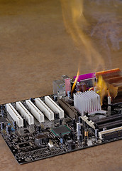 Image showing flames on burning main-board