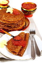 Image showing Buckwheat pancakes with red caviar.