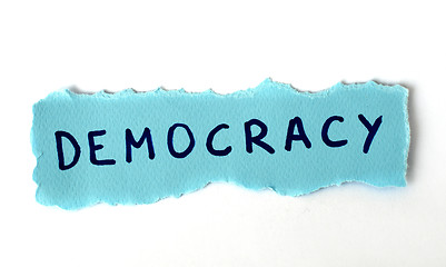 Image showing The word Democracy on blue paper