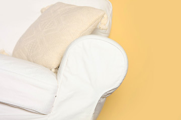 Image showing white couch near yellow wall