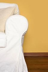 Image showing white couch near yellow wall