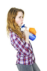 Image showing Young woman with cleaning supplies