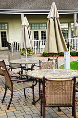 Image showing Patio tables and chairs