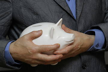 Image showing Holding the money