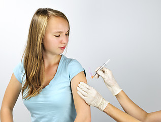 Image showing Girl getting flu shot