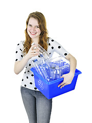 Image showing Young woman with recycling box