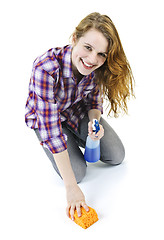 Image showing Young woman washing floor