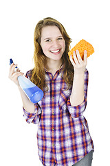 Image showing Smiling girl with cleaning supplies