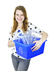 Image showing Young woman holding recycling box