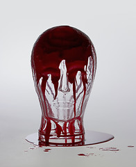 Image showing bloody glass head