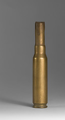 Image showing metallic bullet casing in grey back