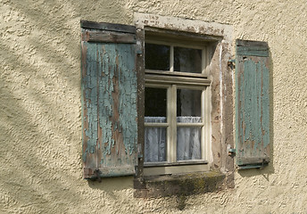 Image showing old window in plastered wall