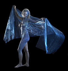 Image showing blue bodypainted woman and fabrics