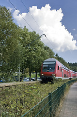 Image showing red train in sunny ambiance
