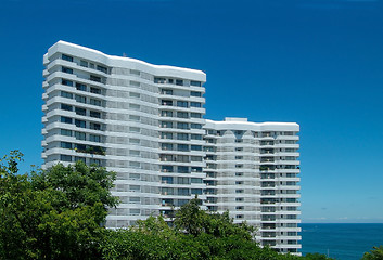 Image showing Two apartment-buildings by the sea