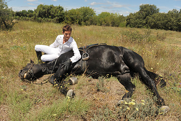 Image showing young man and horse