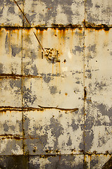 Image showing Rusty tin house wall closeup  vintage background 