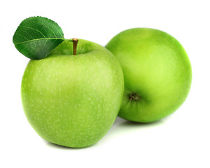 Image showing Green apples with leaves