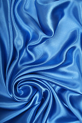 Image showing Smooth elegant blue silk as background 