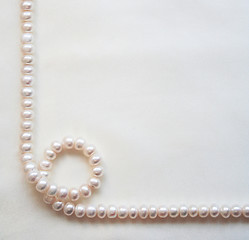 Image showing Smooth elegant white silk with pearls as wedding background 