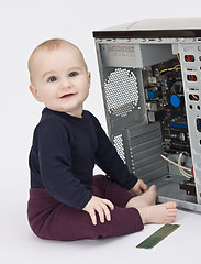 Image showing young child with open computer