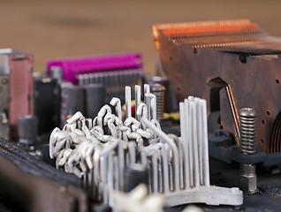 Image showing molten heat sink on computer mainboard