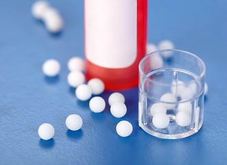 Image showing Homeopathic pills and plastic containers