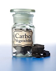 Image showing Carbo Vegetabilis, pure carbon in bottle and pieces