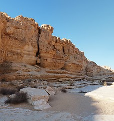 Image showing Wall of desert canyon at sunset