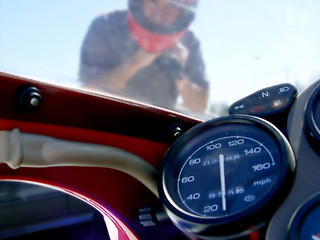 Image showing Man on the red bike