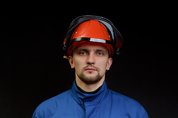 Image showing The worker in overalls